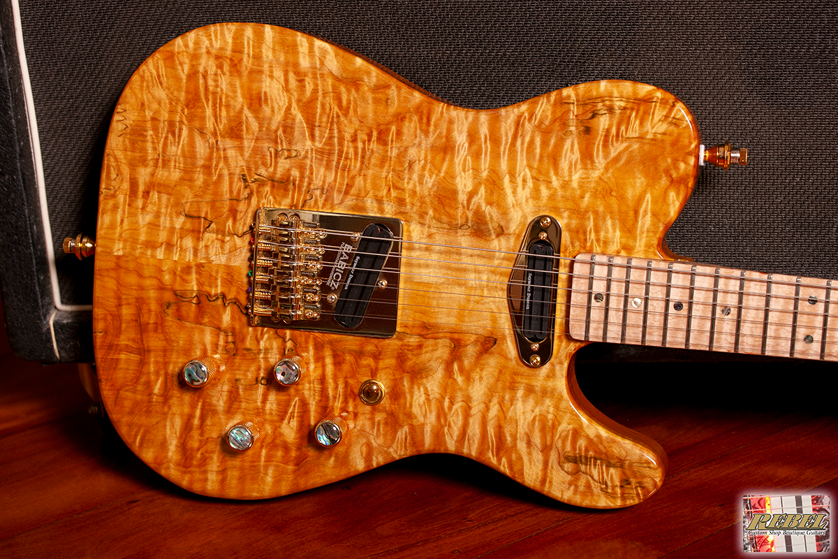 Rebel Custom Guitars Tele Shaped Body with Quilt Maple Top over American Red Alder.